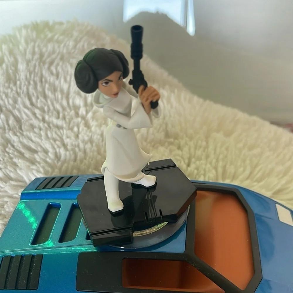 Princess Figure on Blue Toy Car